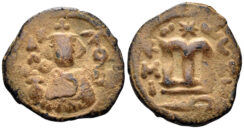 Islamic, Arab-Byzantine. Umayyads, Time of Abd al-Malik. AH 65-86 / 685-705 AD. AE Fals (3.82g, 21mm). Emesa mint (Homs). Walker 59