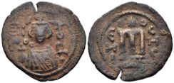 Islamic, Arab-Byzantine. Umayyads, Time of Abd al-Malik. AH 65-86 / 685-705 AD. AE Fals (3.11g, 24mm). Emesa mint. Album 3524